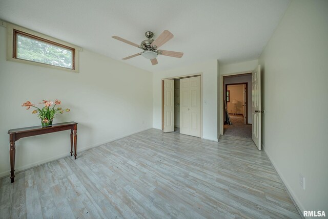 77 Country Pl Unit 77, Springfield, IL 62703 - unfurnished room featuring light wood-style flooring and ceiling fan