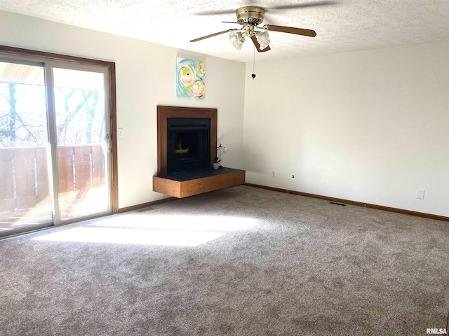 carpeted empty room with track lighting and plenty of natural light