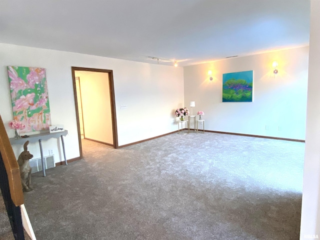 77 Country Pl Unit 77, Springfield, IL 62703 - carpeted empty room with track lighting and baseboards