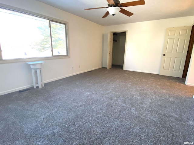 77 Country Pl Unit 77, Springfield, IL 62703 - unfurnished bedroom with carpet flooring and ceiling fan