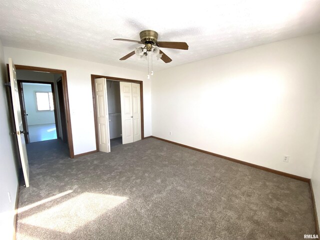 77 Country Pl Unit 77, Springfield, IL 62703 - unfurnished bedroom with a closet, carpet, a textured ceiling, and ceiling fan