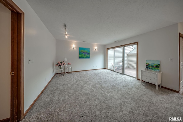 77 Country Pl Unit 77, Springfield, IL 62703 - carpeted empty room with a textured ceiling and ceiling fan