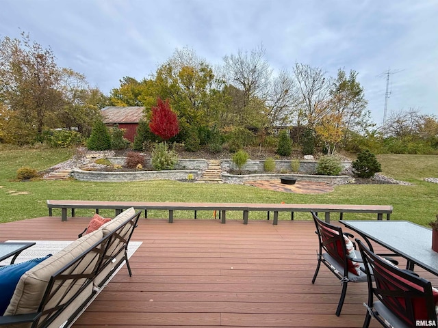 deck featuring a lawn