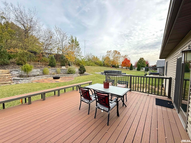 deck featuring a yard