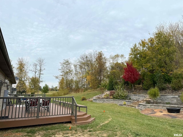 view of yard with a wooden deck