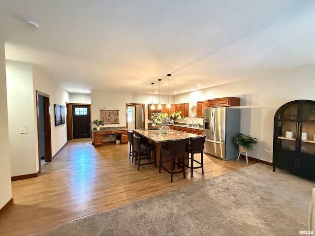 dining area with light wood-type flooring