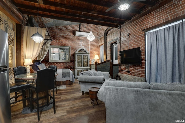 living room with beamed ceiling, brick wall, and wooden ceiling