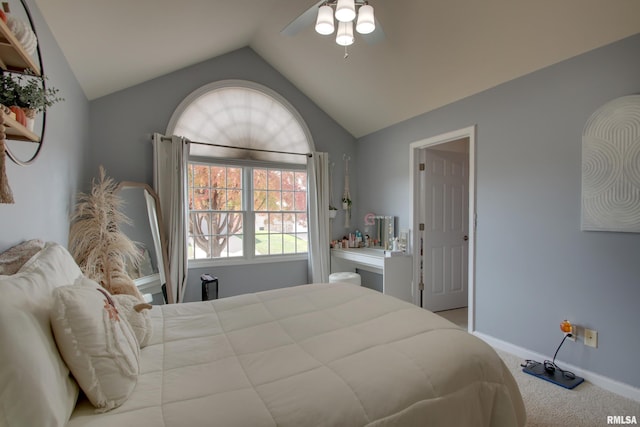 bedroom featuring ceiling fan, carpet, and vaulted ceiling