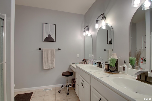 bathroom with vanity and tile patterned floors