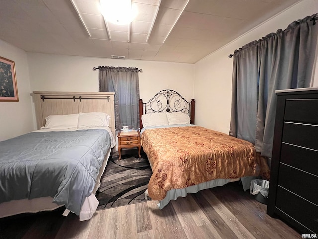 bedroom featuring hardwood / wood-style floors