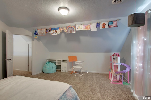 bedroom featuring lofted ceiling, carpet, and a textured ceiling