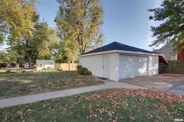 garage featuring a yard