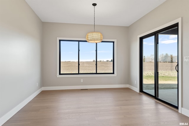 empty room featuring light hardwood / wood-style floors