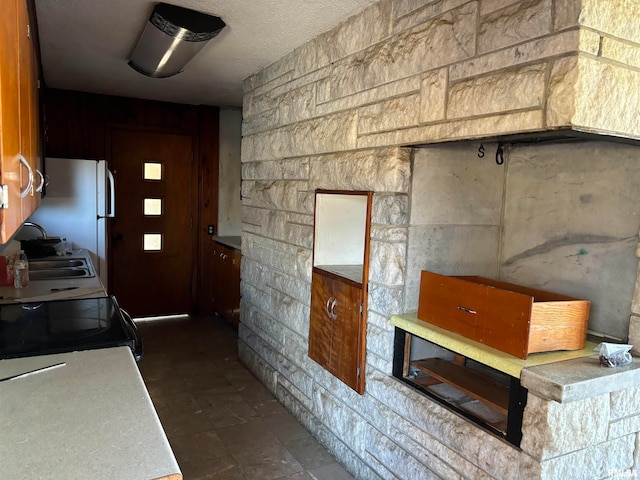 interior space with white fridge and stove