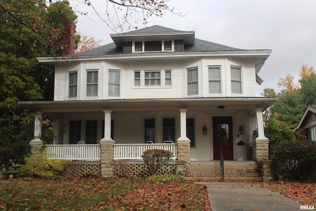 view of front of property featuring covered porch