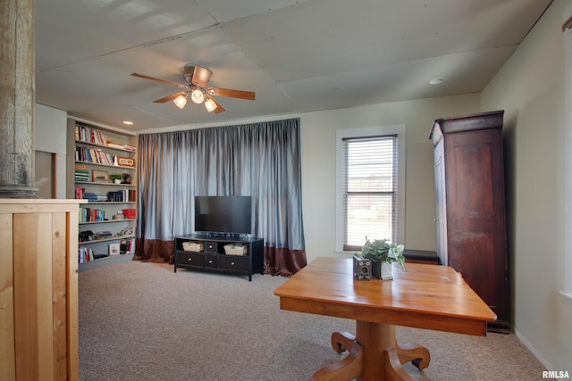 1340 Mulholland St, Nauvoo, IL 62354 - carpeted living area featuring a ceiling fan and recessed lighting
