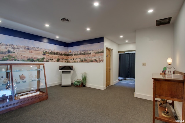 1340 Mulholland St, Nauvoo, IL 62354 - corridor with dark colored carpet, recessed lighting, and baseboards