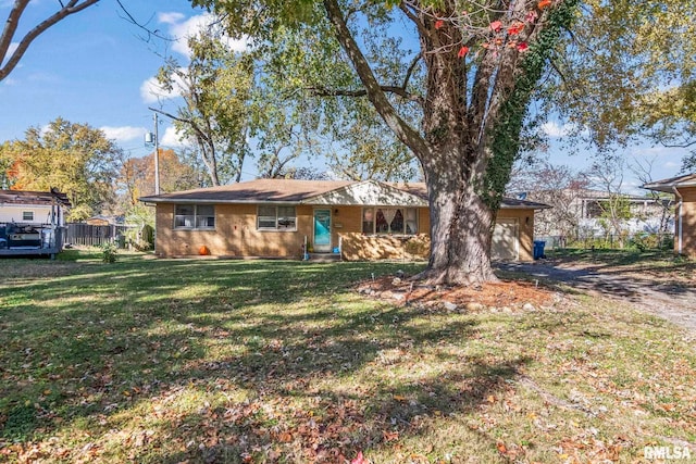 1031 Francella Ct, Springfield, IL 62702 - single story home with a front lawn, fence, and an attached garage