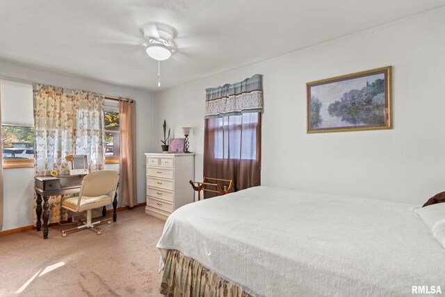1031 Francella Ct, Springfield, IL 62702 - bedroom with baseboards, ceiling fan, and carpet floors