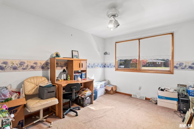 office area with light colored carpet