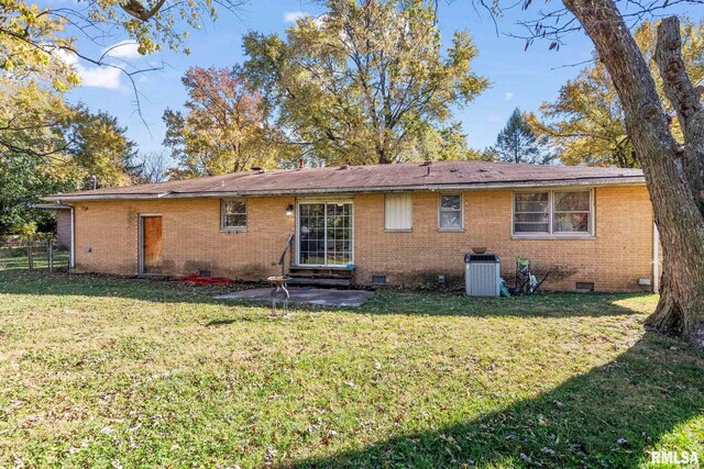 1031 Francella Ct, Springfield, IL 62702 - rear view of house featuring a patio area, crawl space, brick siding, and a lawn