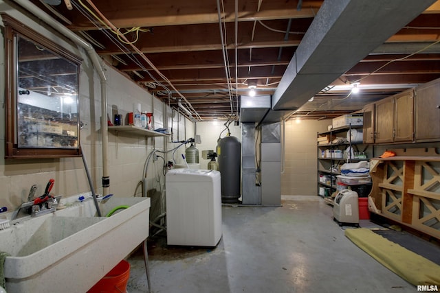 basement featuring heating unit and sink