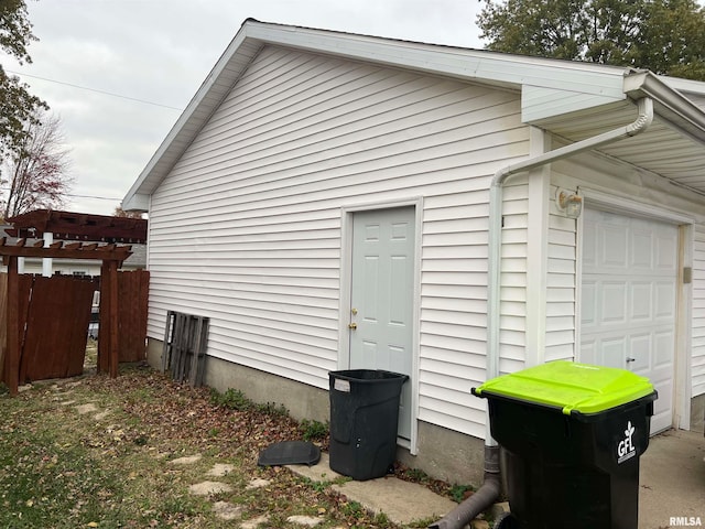 view of side of property with a garage