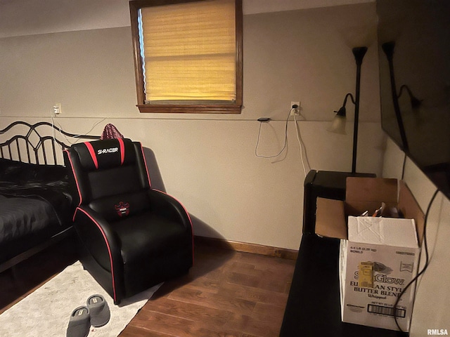 bedroom featuring dark hardwood / wood-style flooring