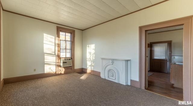 unfurnished living room featuring cooling unit, crown molding, and carpet