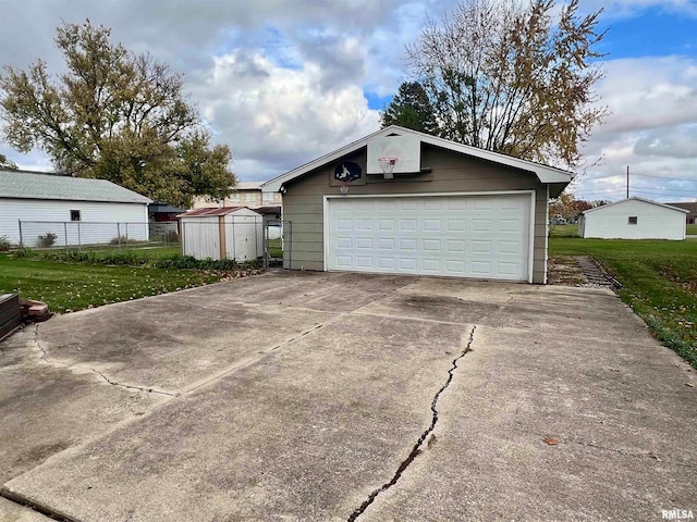 garage with a yard