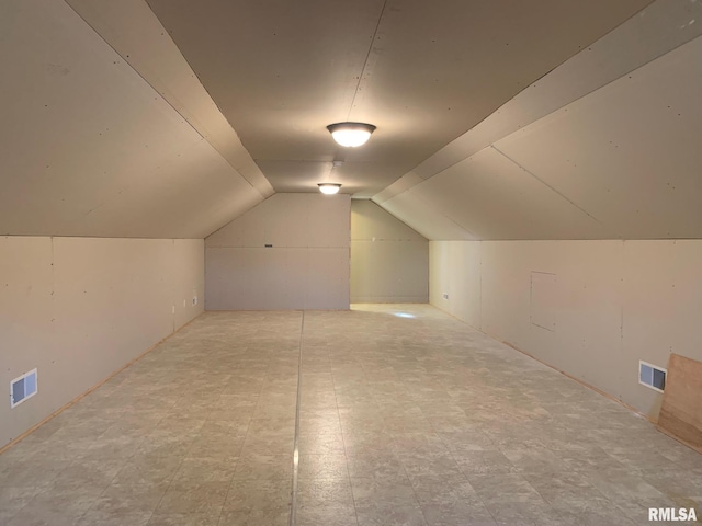 bonus room with vaulted ceiling