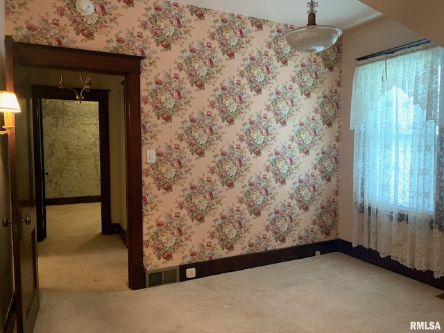 view of carpeted spare room