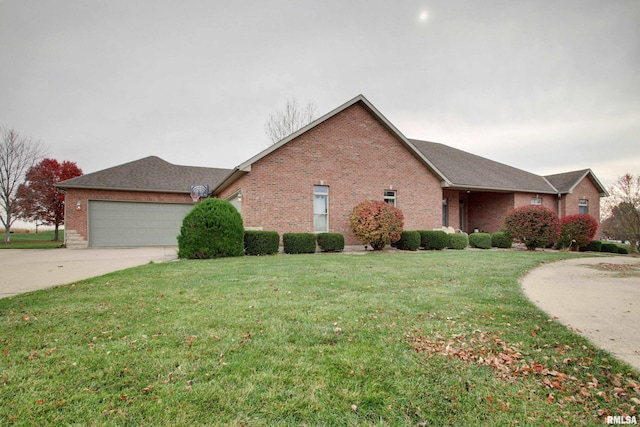 ranch-style home featuring a garage and a front lawn