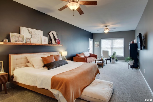 bedroom with ceiling fan and carpet