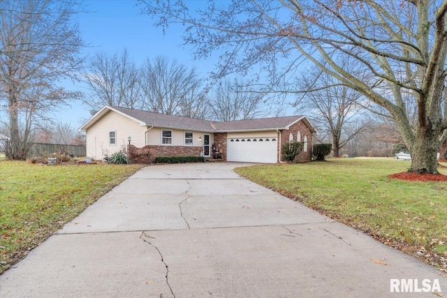 single story home with a garage and a front lawn