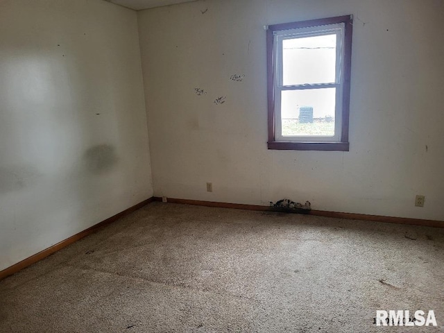 unfurnished room featuring carpet floors