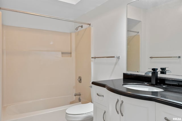 full bathroom featuring vanity, shower / washtub combination, and toilet