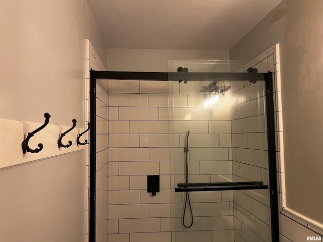 bathroom featuring an enclosed shower