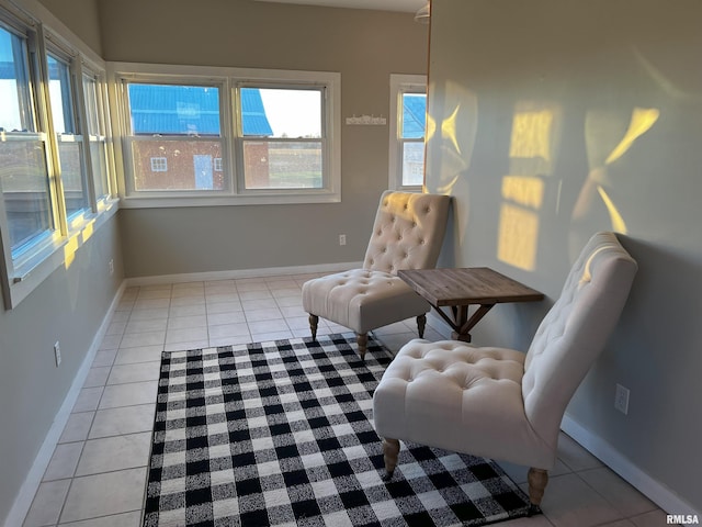 sitting room featuring light tile patterned flooring