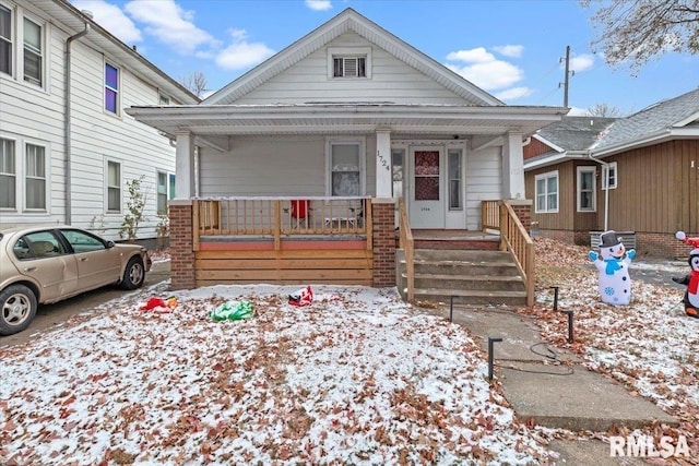 bungalow-style home with a porch