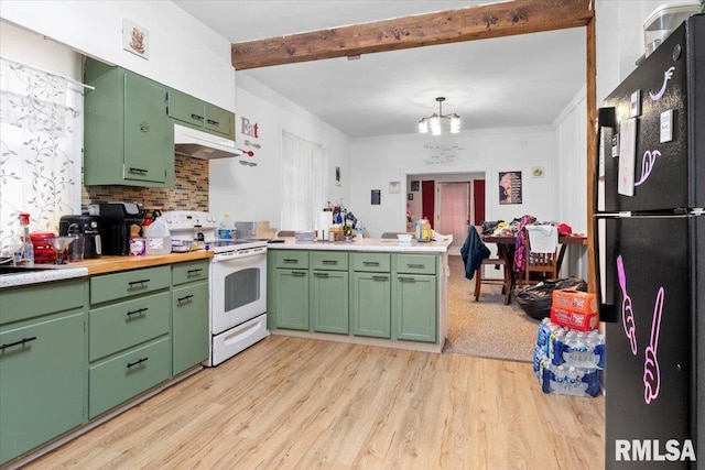 kitchen featuring electric range, green cabinets, black fridge, and light hardwood / wood-style flooring