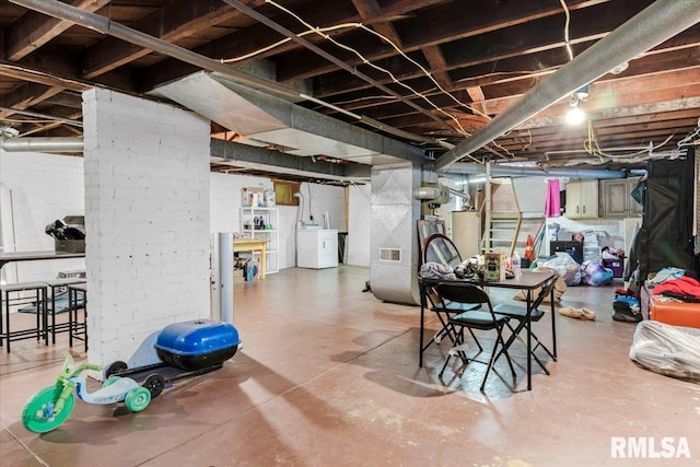 basement with washer and dryer