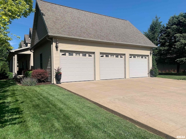 view of side of home featuring a yard