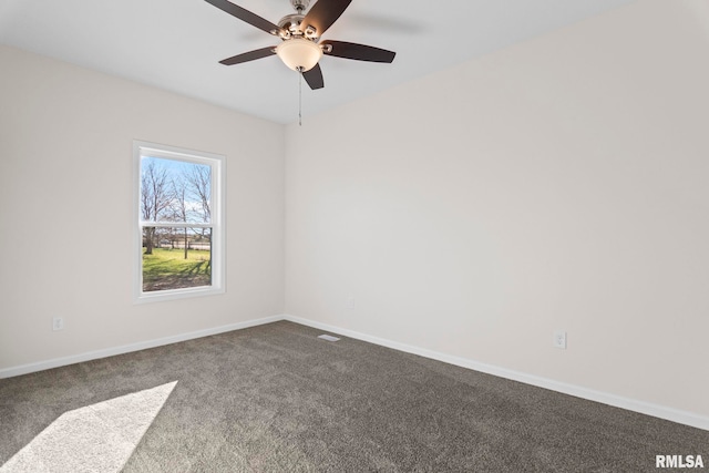 unfurnished room featuring carpet and ceiling fan