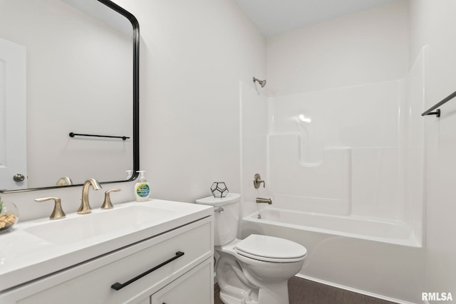 full bathroom with vanity, shower / bathing tub combination, and toilet