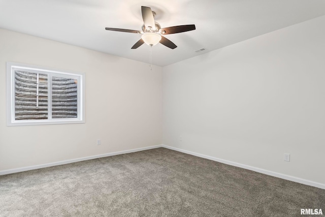 carpeted empty room with ceiling fan