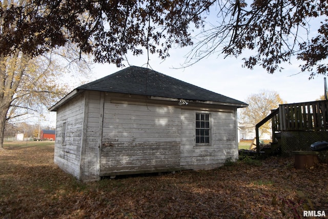 view of side of property featuring a deck