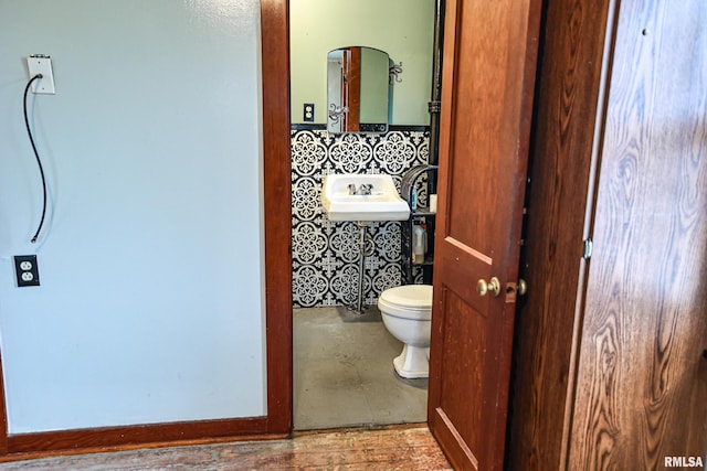 bathroom with toilet and sink