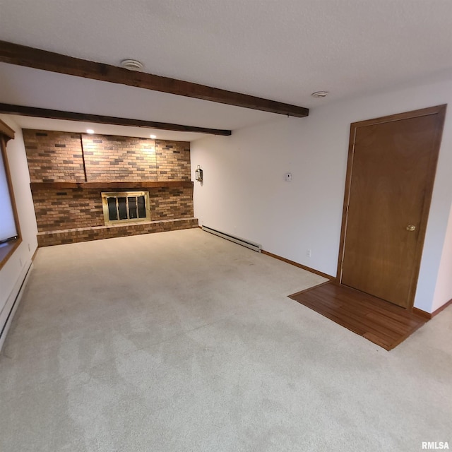 unfurnished living room with carpet flooring, a brick fireplace, brick wall, beam ceiling, and a baseboard radiator