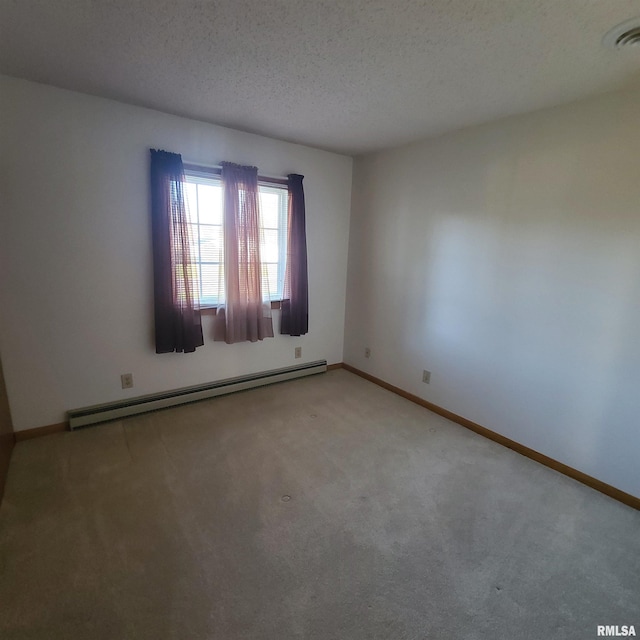 unfurnished room featuring carpet, a textured ceiling, and a baseboard radiator